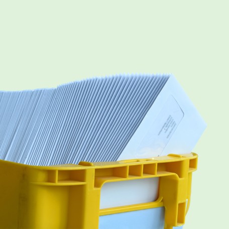 Machine-Inserting Envelopes in Post Box